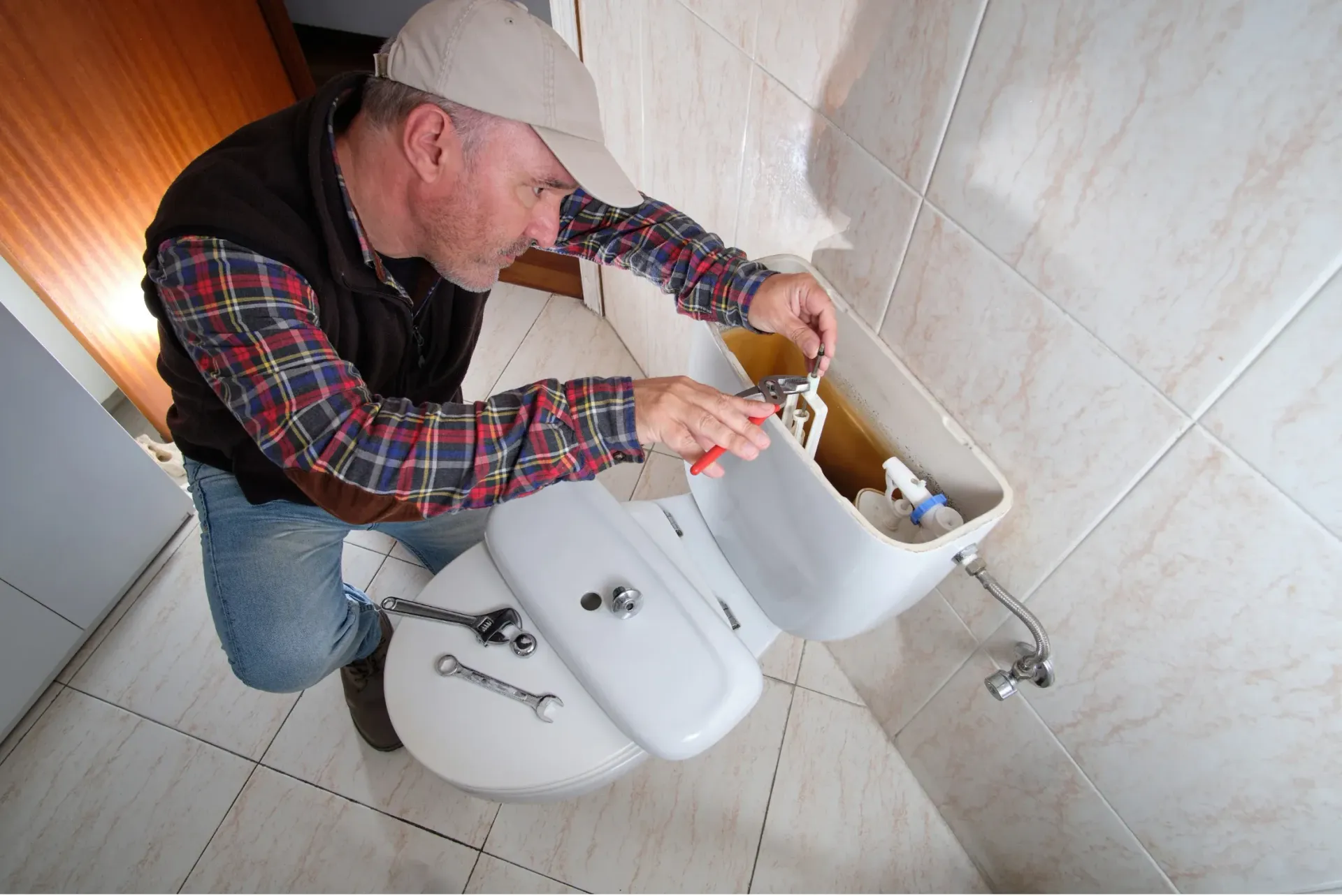 A maintenance worker fixing a reported issue.