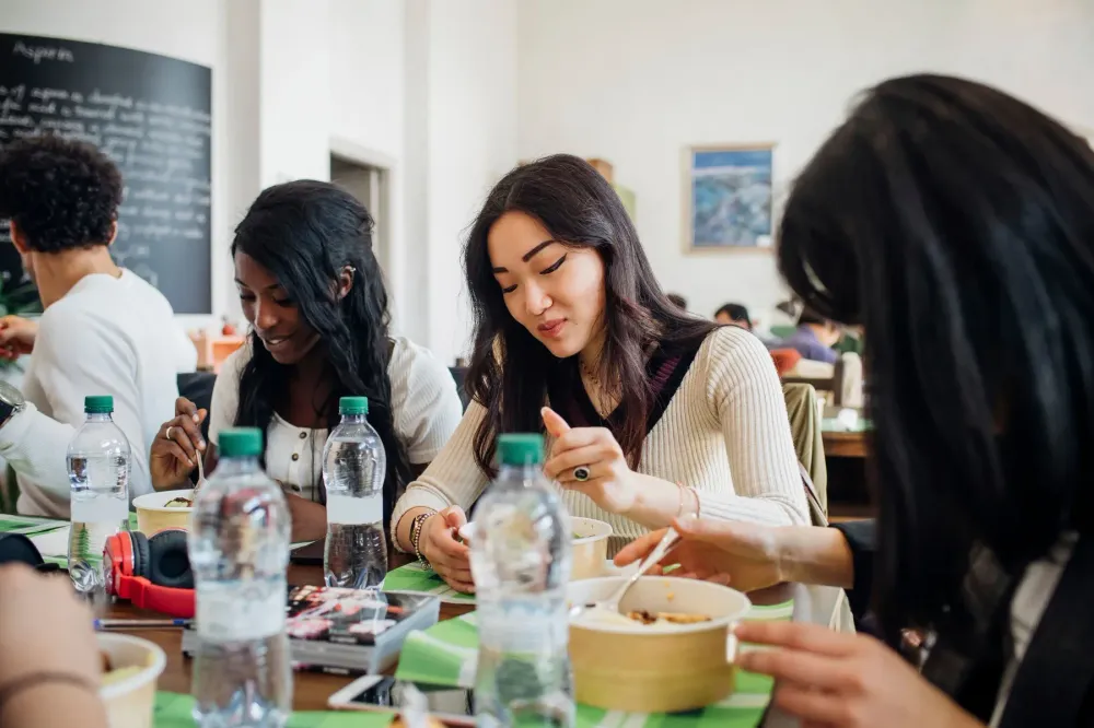 People sharing a meal together at a table.